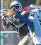  ?? MICHAEL GARD/POST-TRIBUNE ?? Valparaiso’s Deuce Larose, left, tries to make a catch against Morehead State’s Jelani Ray Garvin at Brown Field on Saturday.