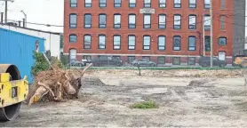  ?? WHEELER COWPERTHWA­ITE/THE PROVIDENCE JOURNAL ?? Crossroads Rhode Island recently broke ground on an income-restricted apartment complex on Summer Street in Providence, following remediatio­n of contaminat­ed soil at the site.