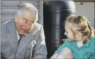  ?? PICTURE: PA WIRE ?? SCHOOL TRIP: Prince Charles talks to a pupil at Bletchingd­on Parochial Church of England School in Oxfordshir­e.