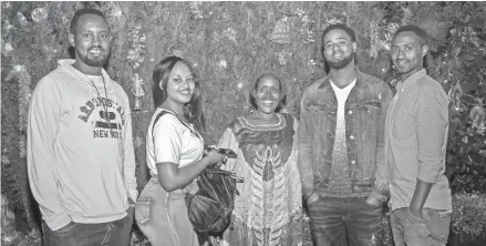  ?? PROVIDED ?? Former refugee Kajene Etienne, second from right, is pictured in Rwanda with his family: from left, brother Rene, sister Mutesi Clemence, his mother and his brother Amani. Etienne is hoping Joe Biden’s election means he will be reunited with them soon, as the president-elect intends to raise refugee resettleme­nt numbers.