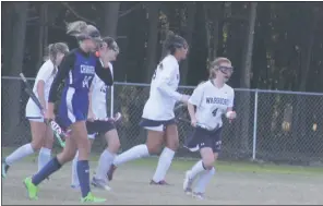  ?? STAFF PHOTO BY TED BLACK ?? La Plata High School senior Katelynn Gordon heads back to midfield with the ball in her left hand after scoring the tying goal on Monday afternoon against Lackey in the Class 1A South Region Section II final. Gordon would later tally the game-winner in the waning seconds of play to lift the host Warriors to a 2-1 victory.