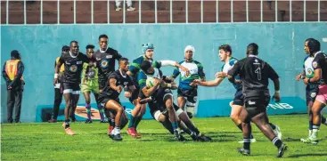  ?? PHOTO: VARSITY CUP ?? FNB Varsity College Comets wing Sivu Mpendu
(pictured)
charges forward for the Comets as they beat the FNB WSU All Blacks 37-18 in their final FNB Varsity Shield group match at the Sisa Dukashe Stadium in East London on Thursday night.