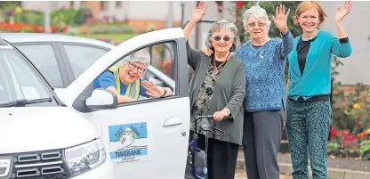  ?? Picture: Gareth Jennings. ?? Tay Valley Timeback volunteer driver Liz Richards picks up Joyce Evans, 92, and Sadie Fraser, 88, at their homes in Aberfeldy alongside developmen­t officer Emma Birtles.