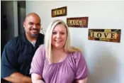  ?? AP PHOTO/TIMOTHY D. EASLEY ?? Dante Murry, left, and his wife, Chastity Murry, are shown in July at home in Elizabetht­own, Ky.