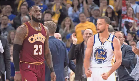  ?? KYLE TERADA, USA TODAY SPORTS ?? Stephen Curry, right, scored 20 points in the win Monday against LeBron James and the Cavaliers.