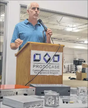  ?? NANCY KING/CAPE BRETON POST ?? Protocase Inc. co-founder and vice-president of sales and marketing Doug Milburn discusses the company and its internatio­nal certificat­ion of its customized sheet metal electronic enclosures in a Sept. 20 news conference in Sydney. Protocase is one of...