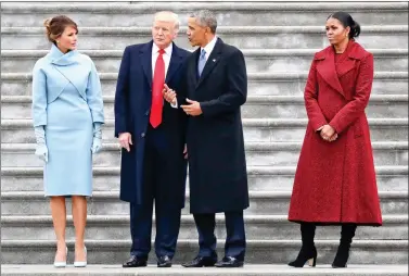  ?? ReuTeRS ?? President donald Trump and former President barack Obama stand on the steps of the uS Capitol, with First lady Melania Trump and Michelle Obama on Friday in washington, dC.