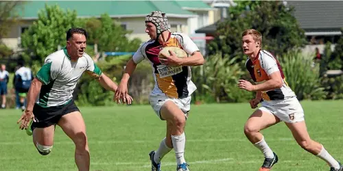  ??  ?? Daniel Schrivers, centre, was a standout for the Upper Hutt Rams in the first leg of the American Ambassador’s Cup sevens series. Schrijvers scored three tries in his side’s runaway final win against Tawal. Teammate Jack Wright is in support.