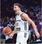  ?? IMAGES ?? Slovenia's guard Luka Doncic reacts during the FIBA Eurobasket 2017 men's final on Sept. 17. Doncic could be a first-round draft target for the Grizzlies this year. OZAN KOSE, AFP/GETTY
