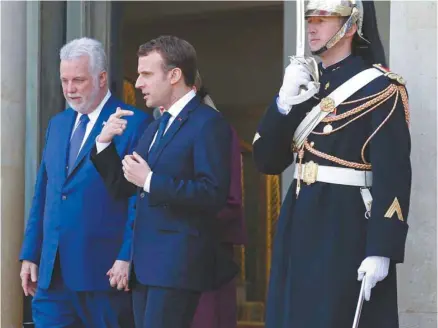  ?? MICHEL EULER ASSOCIATED PRESS ?? Le premier ministre Philippe Couillard a été reçu à l’Élysée par le président Emmanuel Macron.