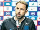  ??  ?? Achievemen­t: Gareth Southgate insists qualifying for Euro 2020 is a ‘big deal’; (right) the players in training yesterday