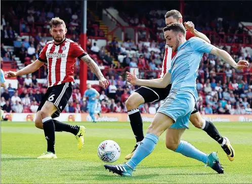  ?? PICTURE: Action Images ?? THICK OF IT: Wolves’ Diogo Jota in action in the goalless draw against Brentford last month