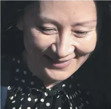  ?? AP ?? Meng Wanzhou, directora financiera de Huawei Technologi­es, sale de su casa en Vancouver ayer.