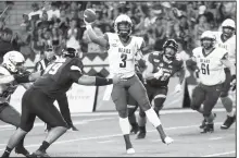  ?? Photo courtesy University of Central Arkansas ?? Central Arkansas sophomore quarterbac­k Breylin Smith attempts a pass against the University of Hawaii on Sept. 21.