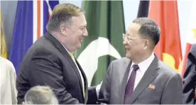  ??  ?? United States Secretary of State Mike Pompeo and North Korea’s Ri Yong Ho.