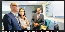 ?? Photo / Sylvie Whinray ?? PM Jacinda Ardern and Health Minister David Clark check in on staff at the Healthline office in Grafton.