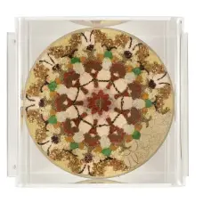  ?? All images copyright Song Dong, courtesy of Pace Gallery ?? Top, right
Mandala 006, 2015, installati­on. Beetroot powder, purple rice, red pepper, curry powder, pepper, aniseed, chicken powder, starch and other condiments, knife, diameter 22.7 cm