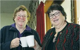  ??  ?? Right: Sharing a cup of tea and admiring ther great collection of teapots are Hetaher Potter of Warragul and Karen Lindorff of Drouin.