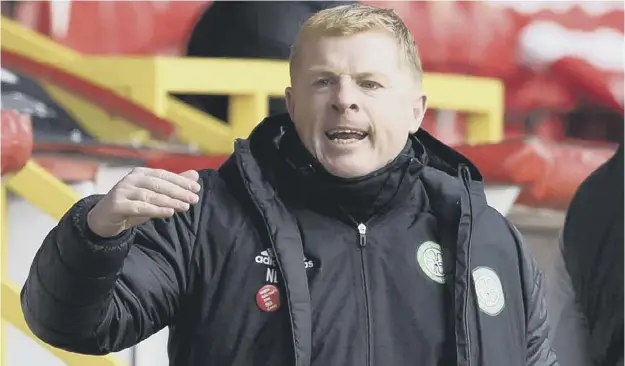  ??  ?? 0 Celtic manager Neil Lennon insists he is not under pressure despite a run of games without a win which has put Rangers in the driving seat.