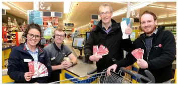  ??  ?? Declan Honan of Whitestown, winner of Lidl Irelandís Christmas Trolley Dash pictured at Lidl Dundalk, Co. Louth, managed to grab €214.44 worth of groceries in just two minutes. He is pictured here with his son Conor (right), Deputy Store Manager Shannon McKenna and Customer Assistant Brendan Coleman.