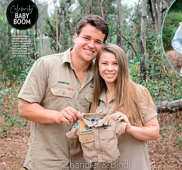  ??  ?? “We have a baby Wildlife Warrior on the way coming in 2021,” Chandler Powell captioned this sweet snap of the pair and their tiny Australia Zoo uniform.