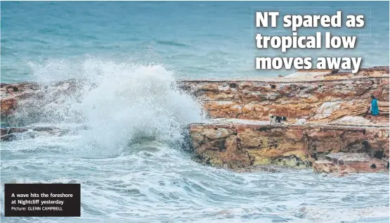  ?? Picture: GLENN CAMPBELL ?? A wave hits the foreshore at Nightcliff yesterday