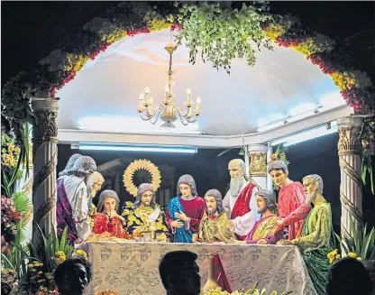  ??  ?? An effigy of the Last Supper seen during a Holy Week parade in Manila in 2018