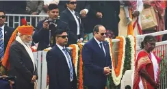  ?? ?? ■ Left: President Droupadi Murmu, Egyptian President Abdul Fattah Al Sissi and Prime Minister Narendra Modi at the Republic Day parade in New Delhi, yesterday.