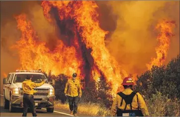  ?? Noah Berger Associated Press ?? GOV. GAVIN Newsom holds regular televised news briefings on the coronaviru­s and wildfires, including the LNU Lightning Complex fire in Lake County, above. They come across as good-faith efforts at transparen­cy.