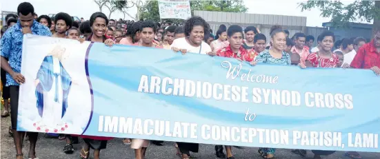  ?? Photo: Simione Haravanua ?? Members of the Immaculate Conception Parish Lami Catholic church marching to mark the Eucharisti­c Celebratio­n Synod Launch on May 20, 2018.