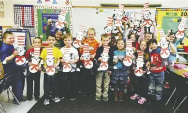  ?? BY CATHY JONES ?? Jennifer Deal's first-grade class celebrates Read Across America Week.