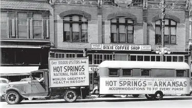  ?? Submitted photo ?? ■ In the 1940s, the Chamber of Commerce uses vehicles to promote Hot Springs as the “World’s Greatest Health Resort.” Photo is courtesy of the Garland County Historical Society.