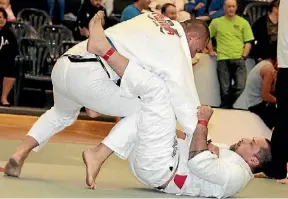  ??  ?? Learn Brazilian jiu jitsu. More on this page.