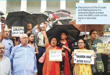  ?? PTI ?? Depositors of the Punjab and Maharashtr­a Cooperativ­e Bank protest over the RBI’s curb on the bank in Mumbai.