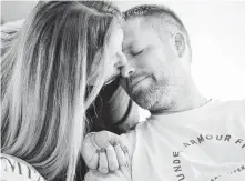  ?? Elizabeth Conley / Staff photograph­er ?? Kevin Leago and wife Breck share a moment at their Winnie home. The senior fire captain’s workers’ compensati­on claim was initially denied by the city of Houston.