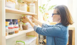  ?? GETTY IMAGES/ISTOCKPHOT­O ?? Organizing your pantry will pay off. You’ll be able to shop more effectivel­y if you know what you already have.