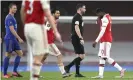  ??  ?? Arsenal’s Eddie Nketiah (right) walks off after he was given a red card for a challenge on the Leicester defender Justin James. Photograph: Will Oliver/AP
