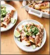  ??  ?? This undated photo provided by America’s Test Kitchen in February 2019 shows Chicken Enchiladas inBrooklin­e, Mass. (AP)