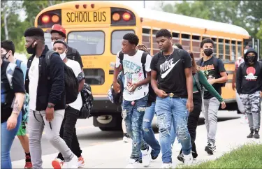  ?? Arnold Gold / Hearst Connecticu­t Media ?? Students arrive for the first day of school at West Haven High School on Monday.