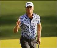  ?? Eric Gay / Associated Press ?? Justin Thomas waves after making a putt on the 10th hole during the second round of the PGA Championsh­ip Friday in Tulsa, Okla.