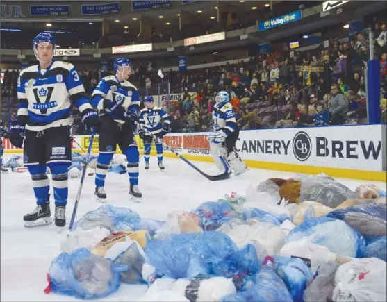  ?? DALE BOYD/Penticton Herald ?? A small army of stuffed animals rained down on the ice at the South Okanagan Events Centre on Saturday during the annual teddy bear toss in support of the Salvation Army.