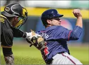  ?? CHARLIE NEIBERGALL/AP ?? Braves infielder David Fletcher (right) was 2-for-8 with two RBIs while replacing Ozzie Albies. Albies should return from the injured list today.