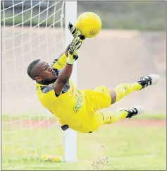  ?? Picture: FREDLIN ADRIAAN ?? GOOD SAVE: Future Tigers goalkeeper Kayaletu Kanzi stops a shot during their ABC Motsepe League match against Callies at the Gelvandale Stadium