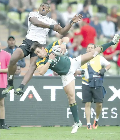  ?? Photo: ?? Sevuloni Mocenacagi in an aerial battle in the Oktoberfes­t 7s in Munich, Germany. Mocenacagi is now ruled out of opening leg of the 2017/18 World Sevens Series due to a torn calf muscle injury.