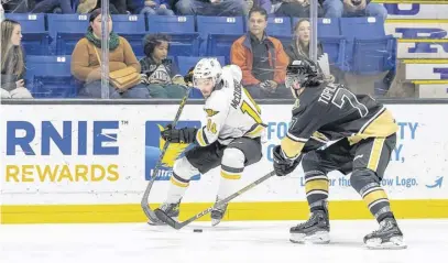  ?? DARRELL THERIAULT • QMJHL ?? Truro Bearcats’ forward Carter McCluskey, left, spent two months with the QMJHL’s Cape Breton Eagles this season before returning to the Maritime junior A league’s Bearcats in January.