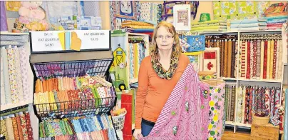  ?? DESIREE ANSTEY/TC MEDIA ?? Faith LeClair transforme­d her garage, located on 18 Andrews Drive in Kensington, into a fabric store called Sew Blessed Quilters.