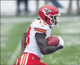  ?? DUSTIN BRADFORD / Getty Images ?? The Chiefs’ Byron Pringle races into the clear as he returns a kickoff 102 yards for a touchdown during Sunday’s game against the Broncos in Denver.