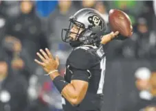  ?? Andy Cross, The Denver Post ?? Colorado quarterbac­k Steven Montez throws in the first quarter against Washington at Folsom Field on Sept. 23. The Buffs are mired in a three-game losing streak as they head to Oregon State this weekend.