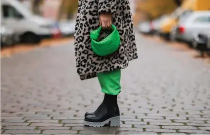  ?? Photograph: Jeremy Moeller/Getty Images ?? Italian fashion label Bottega Veneta has made this lurid shade of green its signature colour.