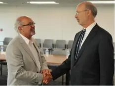  ?? ?? Dean Gartland, CEO of Washington City Mission, shakes hands with Gov. Tom Wolf in June 2016 after taking part in a roundtable discussion about the opioid epidemic.